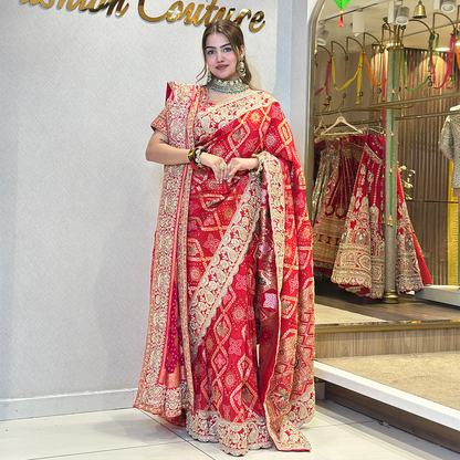Red Bridal Saree with Intricate Gold Zari Embroidery and Traditional Border