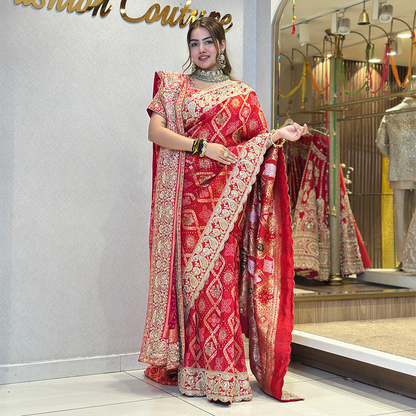 Red Bridal Saree with Intricate Gold Zari Embroidery and Traditional Border