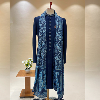 This stylish Dark Blue Indo Western paired with a luxurious embroidered shawl for men