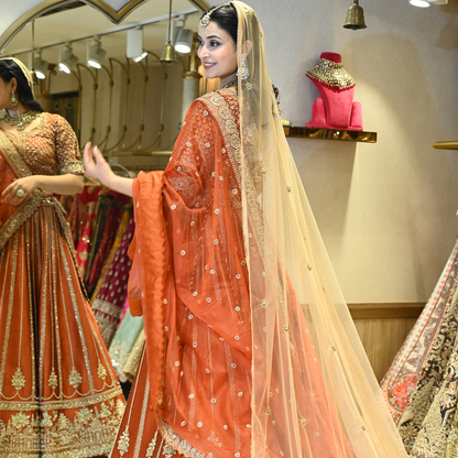 Rust Bridal Raw Silk Embellished Lehenga Set with Two Dupattas