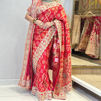 Red Bridal Saree with Intricate Gold Zari Embroidery and Traditional Border