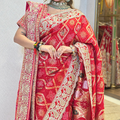 Red Bridal Saree with Intricate Gold Zari Embroidery and Traditional Border