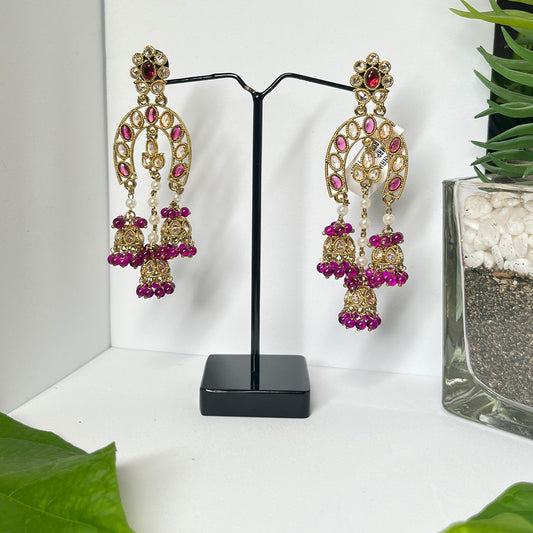 Jhumka Earrings Studded with pearls and Purple Stones