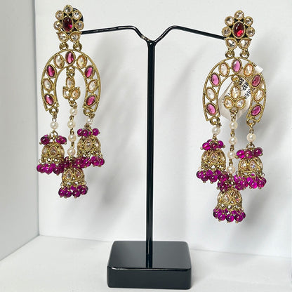 Jhumka Earrings Studded with pearls and Purple Stones